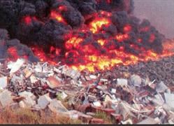 Požár skládky komunálního dopadu u obce Vrbička okres Louny.  