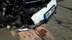 Osobní automobil skončil v plotě rodinného domku  