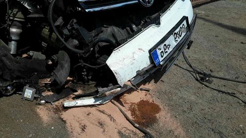 Osobní automobil skončil v plotě rodinného domku  