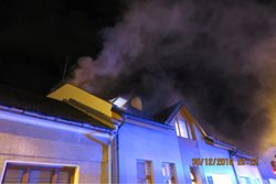 Od komínu začala hořet střecha, Libušina ul. Olomouc.