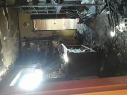 Plameny zničily dílnu u rodinného domu