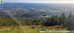 Záchrana paraglidistky z terénu pod Černou horou